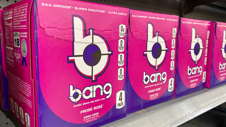 Row of 4-pack Bang energy drinks on shelf