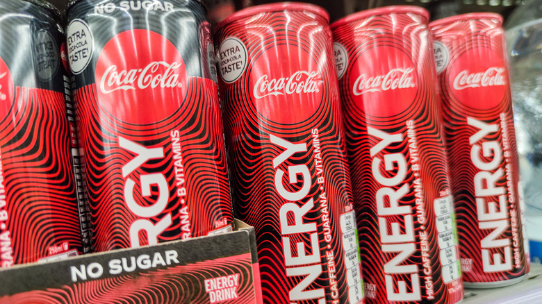 Varieties of Coca-Cola Energy drink cans on shelf