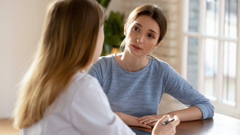 woman speaking to her doctor