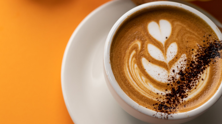 latte closeup with flower design