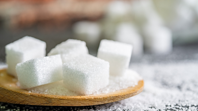 Sugar cubes on a spoon