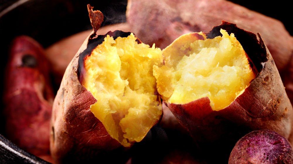 A closeup of a baked potato