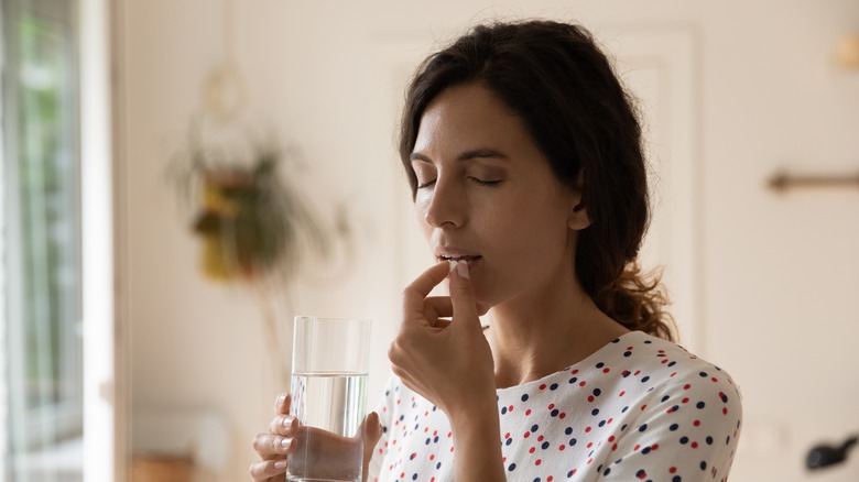 woman taking antidepressants