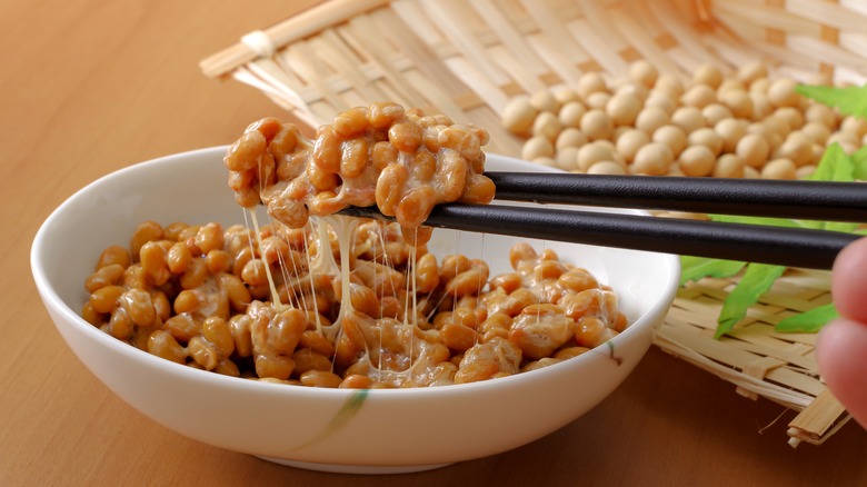 natto in bowl with chopsticks