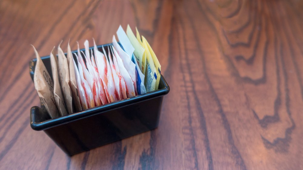 white, pink, blue, brown, artificial sweeteners and sugar bags for coffee,tea and drinks