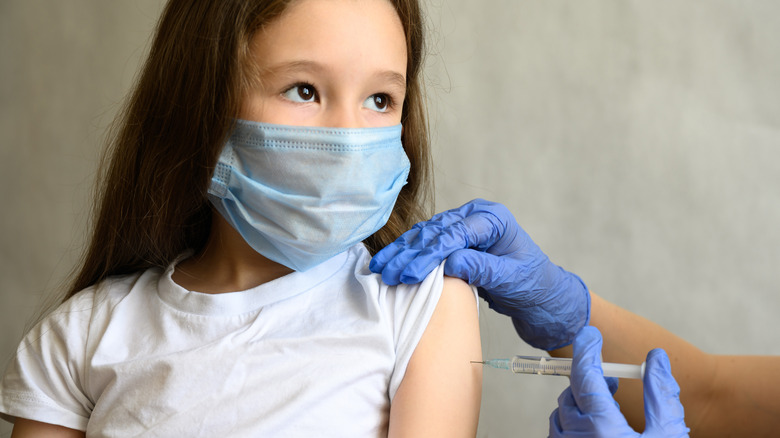 Child receiving vaccine