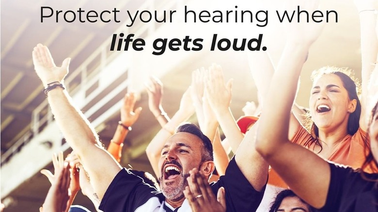 People cheering with the words "Protect your hearing when life gets loud" promo from hear.com