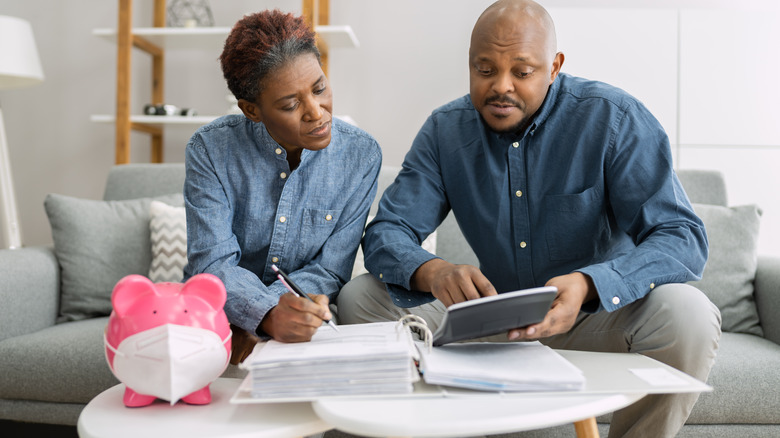 older couple calculating finances