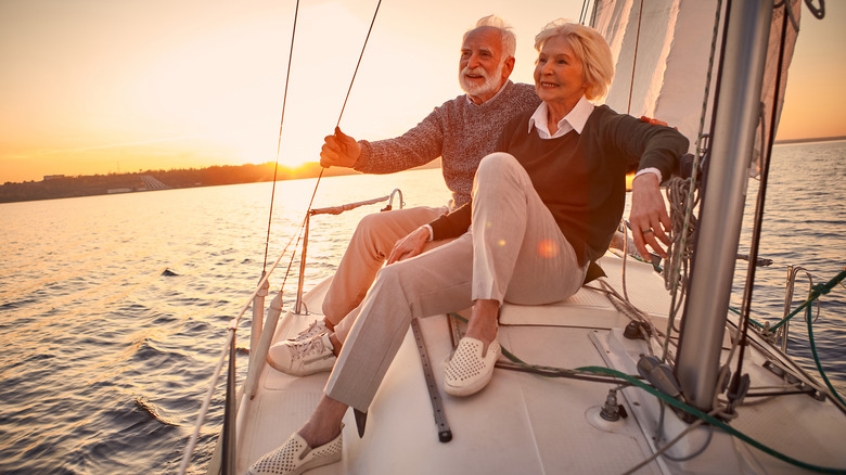 happy older couple on a boat