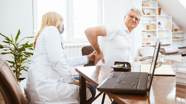 Doctor checking kidneys