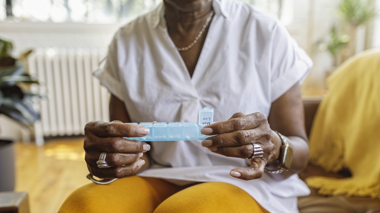 Woman taking medication