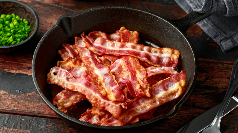 Fried bacon is a cast iron skillet