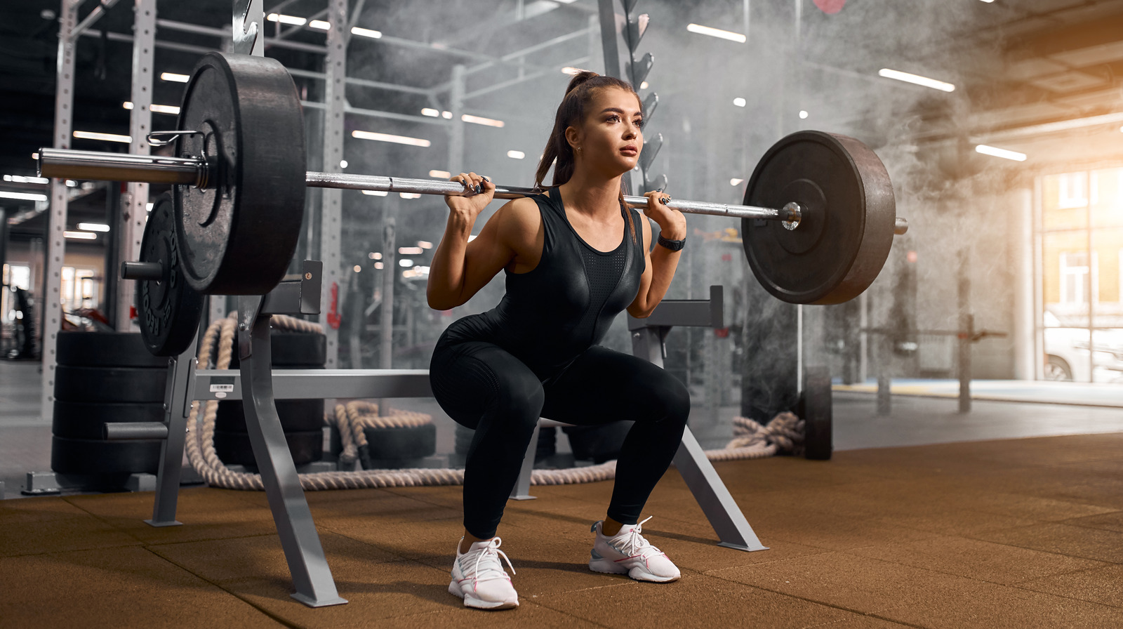 Are squats with weights more effective for health and fitness?