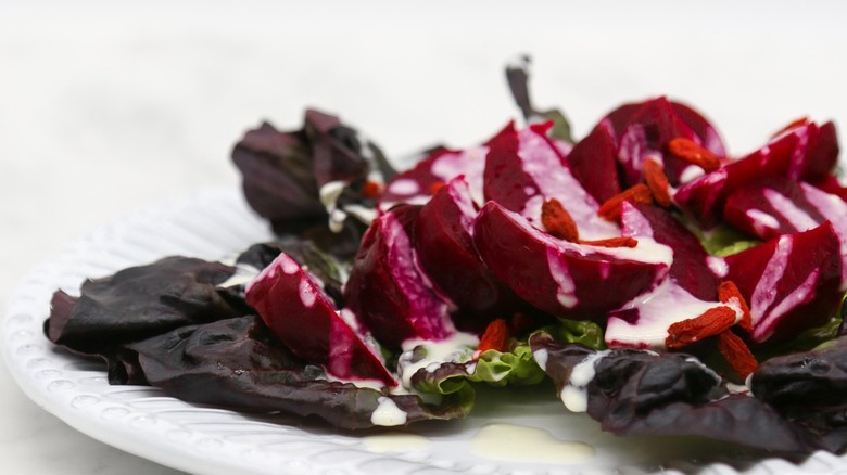 sliced beet salad with dressing