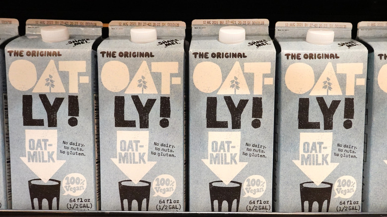 oatly cartons on grocery shelf