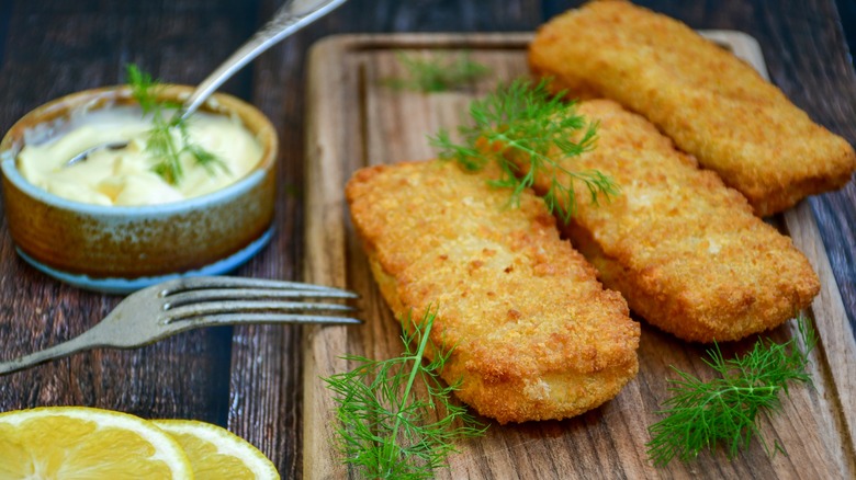 deep fried fish on wooden board