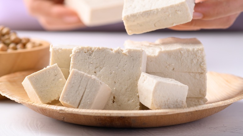 tofu served on wooden plate