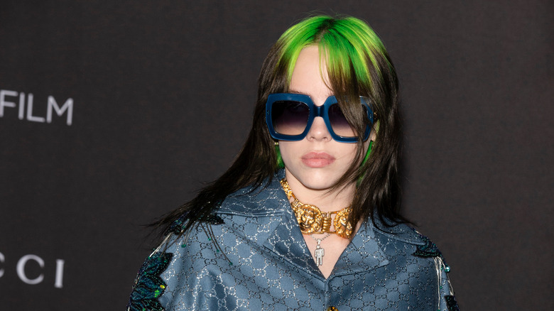 Billie Eilish in Jackie O-style sunglasses 