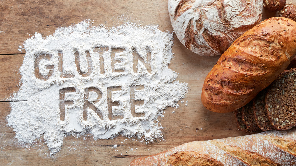 gluten free spelled out in flour next to gluten free bread