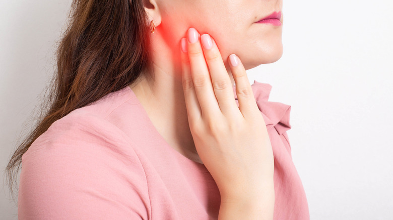 woman holding jaws