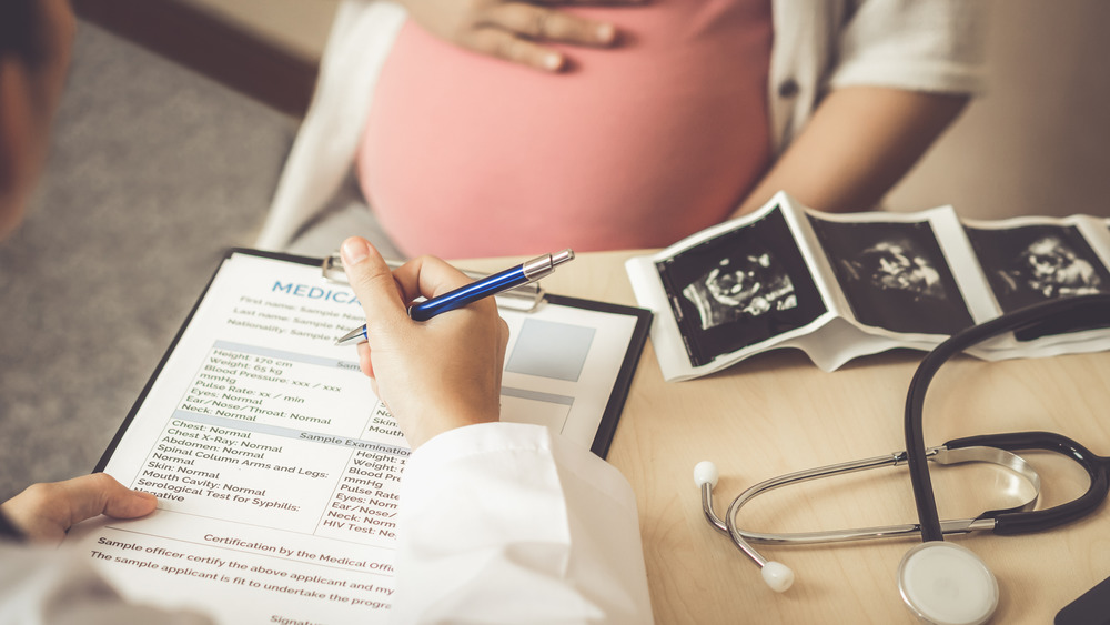 pregnant woman doctor's office