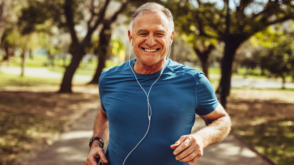 older man jogging outside