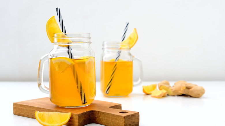 yellow detox drink in mason jars