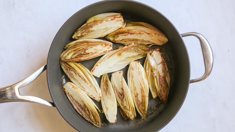 Braised endive in pan