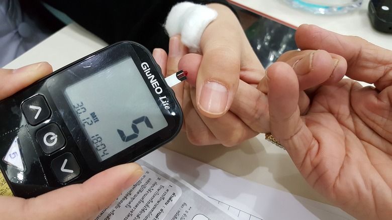 meter measuring blood glucose 