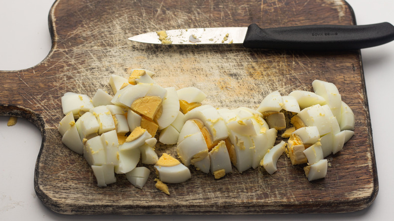 chopped hard boiled eggs on board