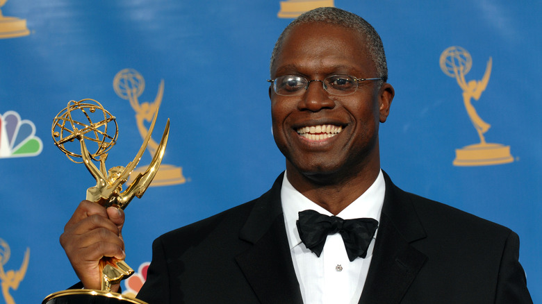 Andre Braugher holding Emmy award