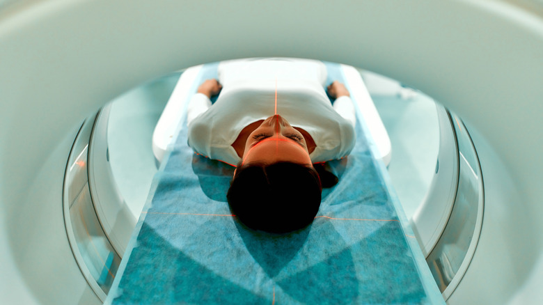Patient lying in MRI machine