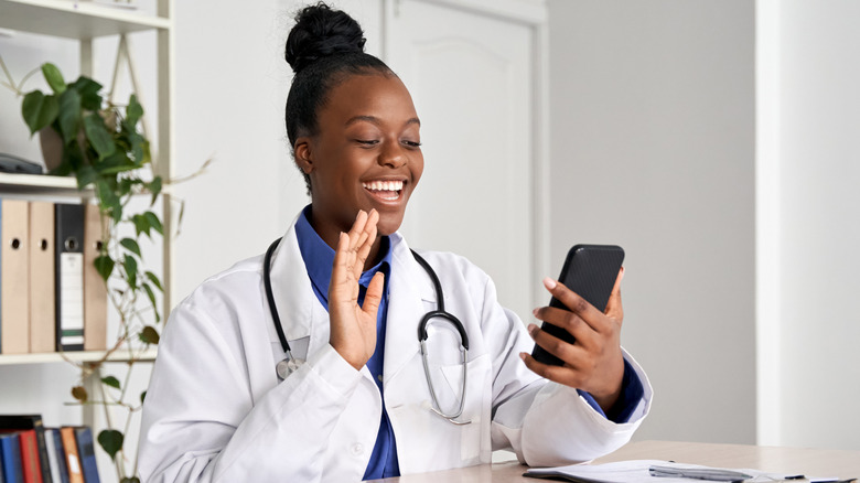 a doctor talking to a patient over zoom