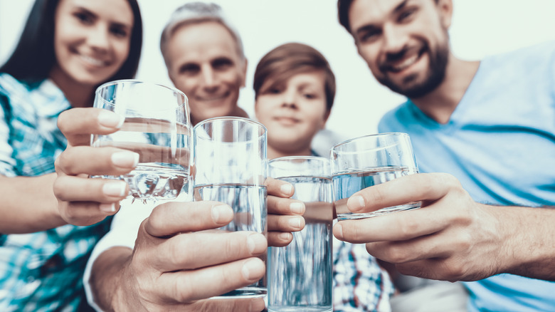 family drinking water 