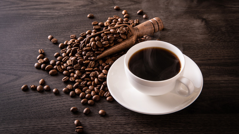 Coffee cup and coffee beans