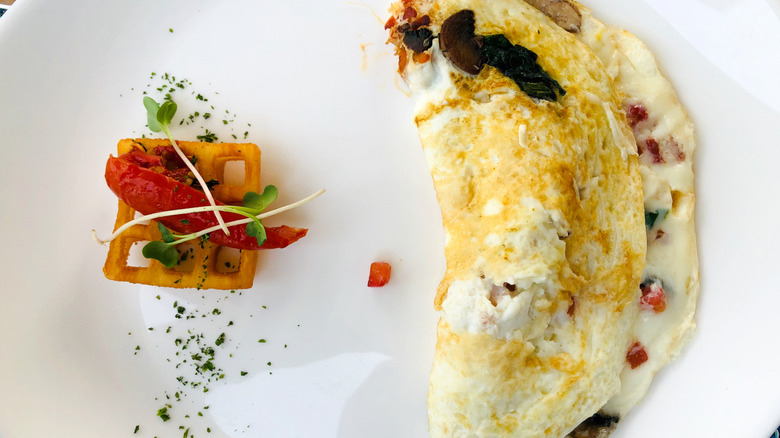 An egg white omelet with cheese and vegetables