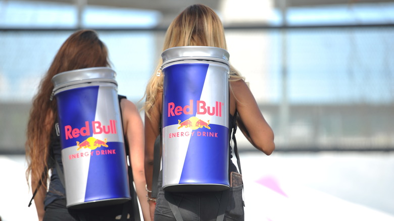 Women with Red Bull backpacks