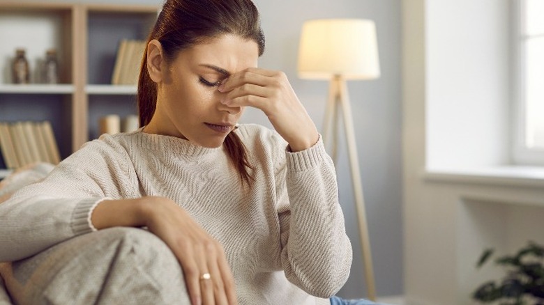 Woman suffering from a headache