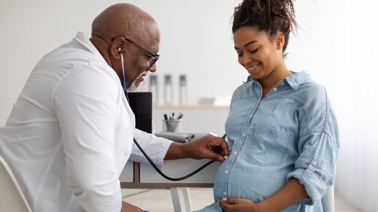 A pregnant woman is at the doctor