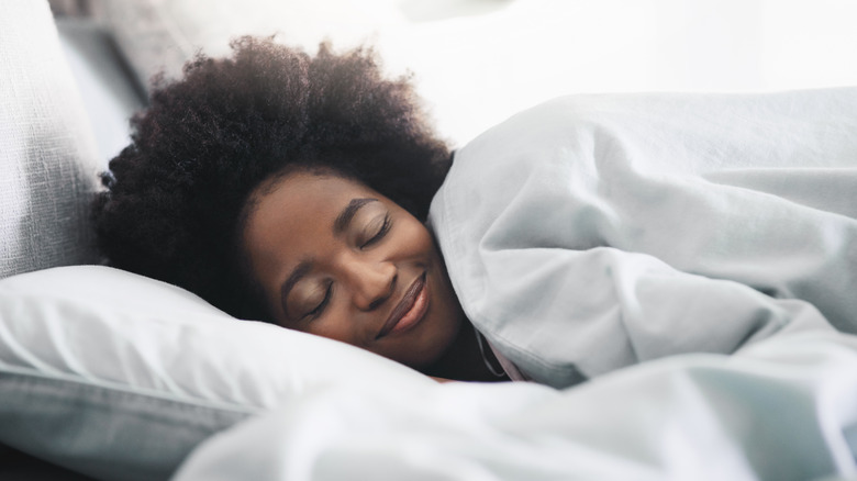 Happy woman sleeping