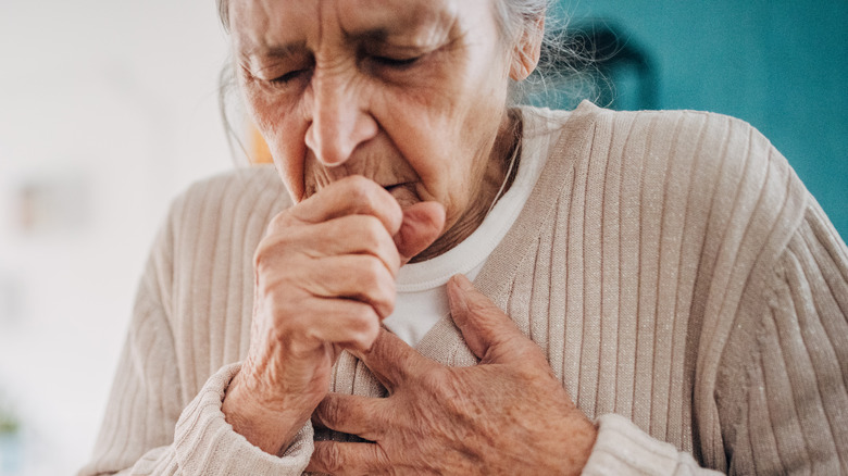 Woman coughing