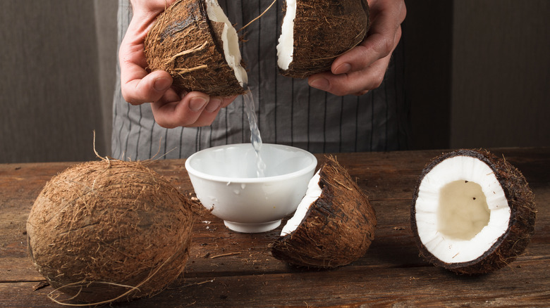 fresh coconut water poured into a bowl