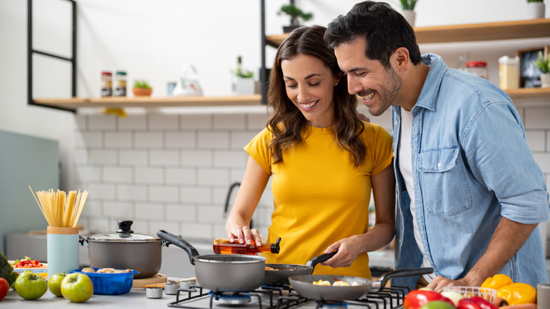 couple cooking healthy at home