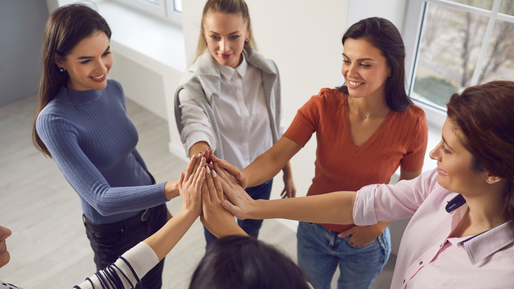 Bunch of young women in a circle