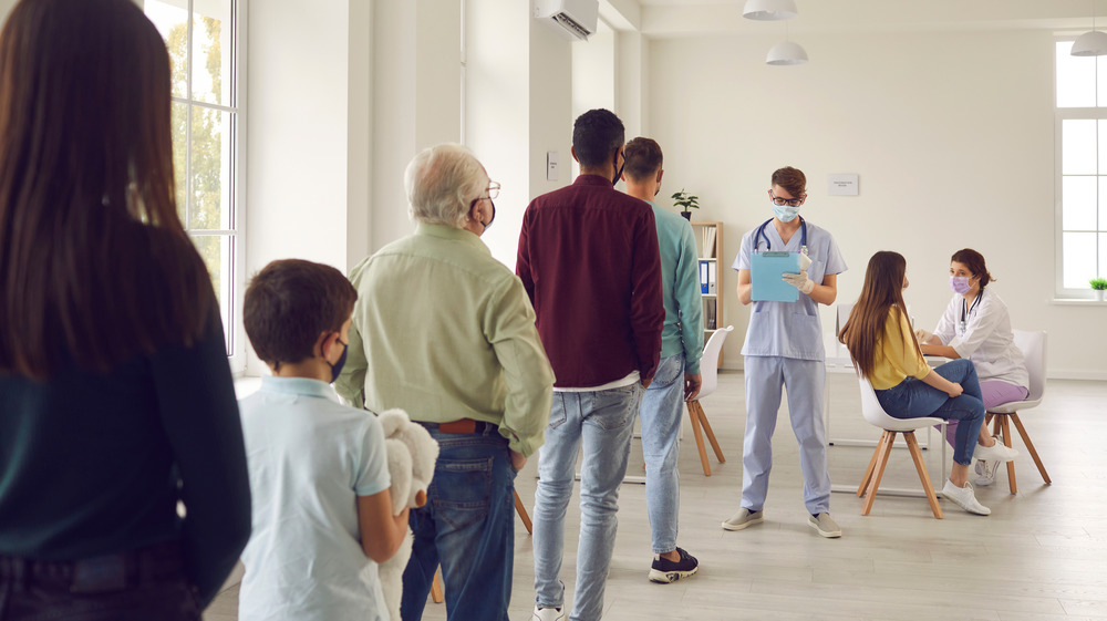 Line of people being vaccinated