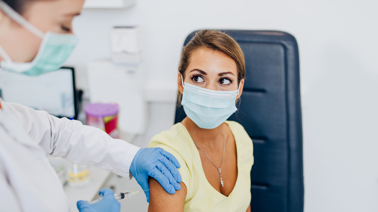 Woman about to get vaccinated 