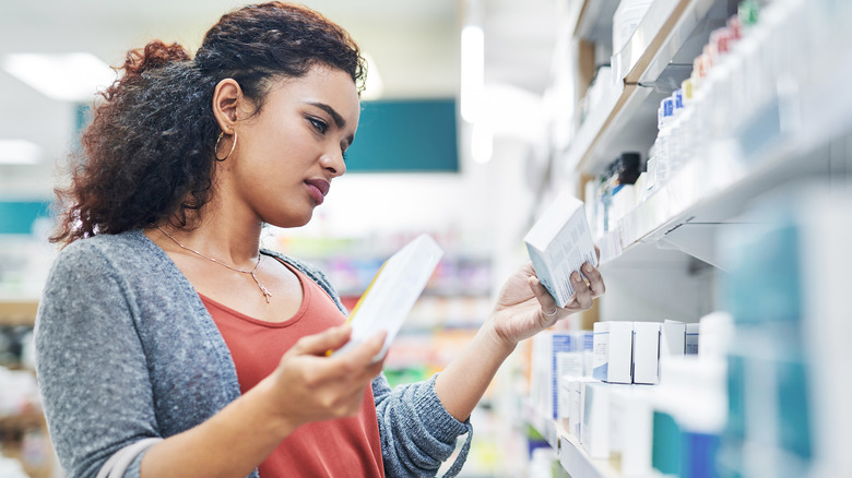 Woman shopping at pharmacy