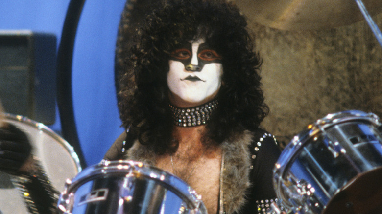 Eric Carr playing the drums with his iconic "Fox" makeup