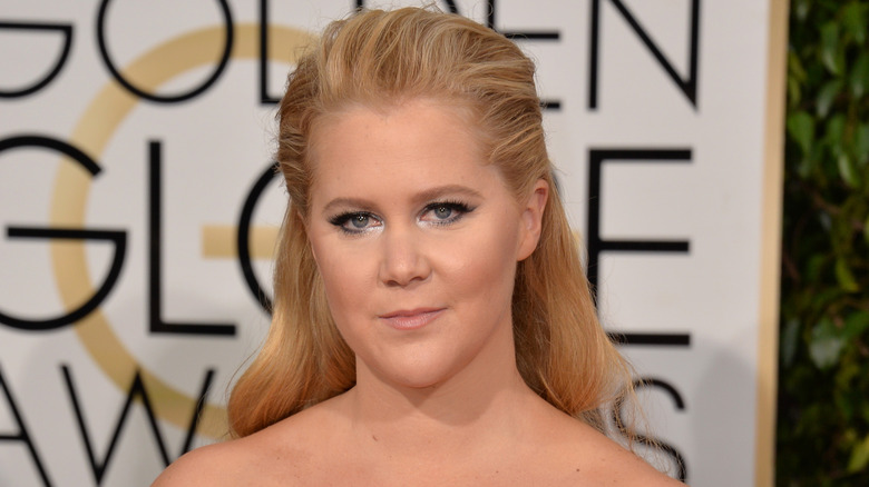 Amy Schumer looking pensive at the Golden Globes