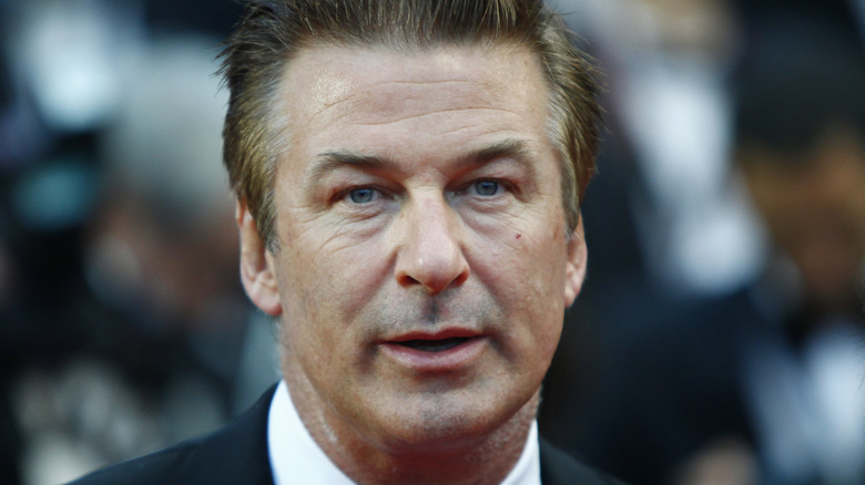 Alec Baldwin in black suit